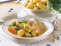 Helstekt kotlettrad med dragon- och konjakssås