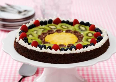 Kladdkaka med honungsjordnötter och tranbär